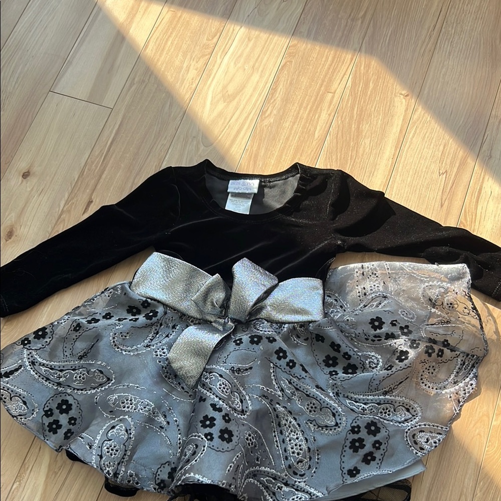 Iris & Ivy Black and Silver Formal Dress with Playful Design